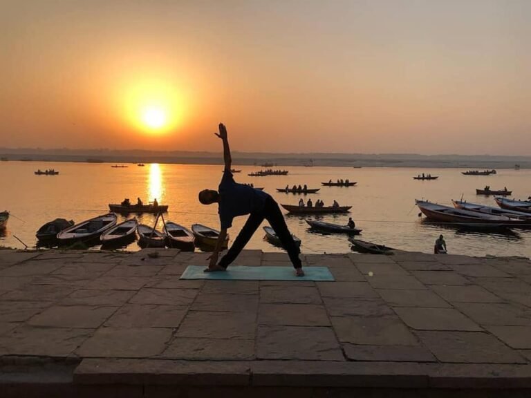 Varanasi Sunrise Glory: A Boat Ride, Yoga, & Ganga Aarti Experience